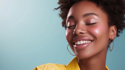 Joyful afro beauty in pastel clothes, glitter makeup, and a radiant smile.