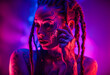 © Hassan Rehman - Cocky Girl with Dreadlocks in Ultraviolet neon light