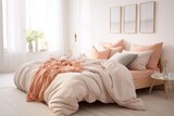 Fototapeta  - scandinavian bedroom interior with pastel peach bedding and white walls with abstract art above bed. Cozy home apartment. 