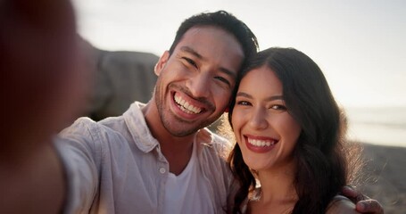 Canvas Print - Sunset, selfie and face of happy couple at beach on holiday, travel or summer vacation on valentines day date. Portrait, man and woman take pictures at ocean together for love, smile or laugh at sea