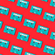 © ADDICTIVE STOCK - Collection of retro cassettes arranged on red surface