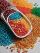 Photo Of Naturefriendly Biodegradable Plastic Granules Different Colors On Table, Recycling Concept