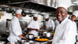 © Kondor83 - Smiling African American chef in restaurant kitchen