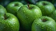 wet green apples closeup