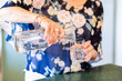 © Austockphoto - Middle aged woman pouring a glass of water in her kitchen