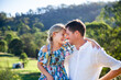 © Austockphoto - Intimacy or father and daughter looking at one another smiling outside on farm