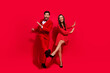 canvas print picture - Full size portrait of positive crazy partners have good mood xmas eve dancing isolated on vivid red color background
