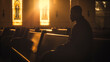 african american man praying in church with blurred background - faith and religion concept