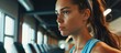 © The 2R Artificiality - Female athlete analyzing running form on treadmill.
