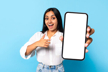 Wall Mural - Indian Woman Holding And Pointing At Big Blank Smartphone, Collage