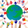 Children's hands in the colors of the world flags that are oriented towards the globe
