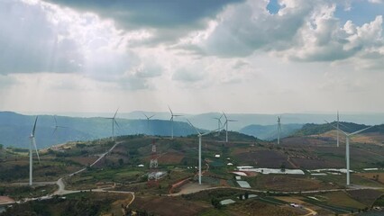 Wall Mural - eco energy energy concept windmill on the hill with sunset