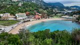 Fototapeta  - Panoramic view of the beautiful seaside resort of Paleokastritsa, Corfu Island, Greece.