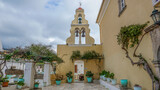 Fototapeta  - The bell tower of the Monastery of Our Lady in the resort of Paleokastritsa, Corfu Island, Greece.