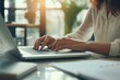 © Areesha - Close up of business woman hands typing on laptop computer, searching and surfing the internet on office desk, online working, telecommuting, freelancer at work concept