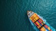 © Suwanlee - Cargo ship transporting containers across the sea.