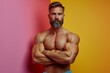 A handsome and muscular man showcasing strength and fitness, with a bearded and athletic physique.