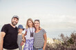© MACO - Family portrait along the Mediterranean Sea on an island in summer.
