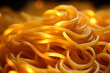 An intimate look at spaghetti's luminous texture, this photo showcases the art of pasta in stunning yellow and golden hues