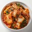 Kimchi, a fermented side dish that is unique to Korea. Carefully prepared from Chinese cabbage or radish. Seasoned with chili, garlic and various spices.