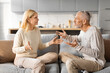 © Prostock-studio - Senior married couple having fight, yelling at each other at home