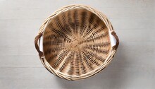 Wicker Basket On White Background Top View