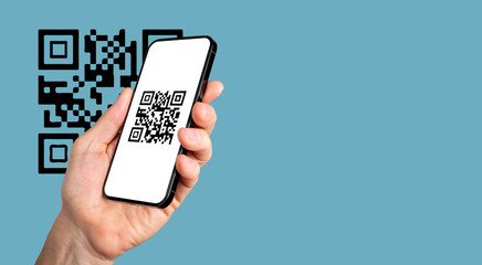 Wall Mural - scanning qr code with mobile phone app. qrcode scanner on smartphone screen in hand. banner
