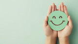 Fototapeta  - Hands holding green happy smile face , good feedback rating, positive customer review.