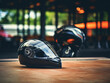 A motorcycle insurance document is laid out on a table, next to a motorcycle helmet 