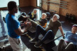 © Davor - Group of senior people working out with trainer in gym