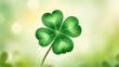 Four leaf green clover for good luck on St. Patrick's Day, bright green background, festive spring concept, st. patrick's clover symbol