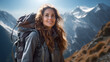 © photosaint - beautiful young woman tourist with a backpack travels on a hiking trip in the mountains. tourism and outdoor travel.