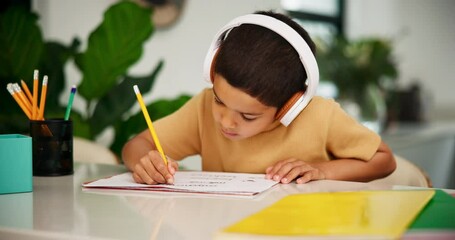 Wall Mural - Child, headphones or pencil to learn writing with audio, relax or classical music for creativity in home school. Boy, learning alphabet and podcast tutor for language development and calm in kitchen