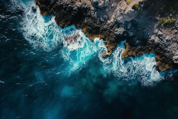 Wall Mural - Aerial view of the ocean rocky shore Capturing the raw beauty and power of nature with the contrast between land and sea