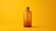 © Anna - a brown glass bottle with a cork top sitting on a yellow background with a shadow of a bottle on the bottom of the bottle and a cork top of the bottle.