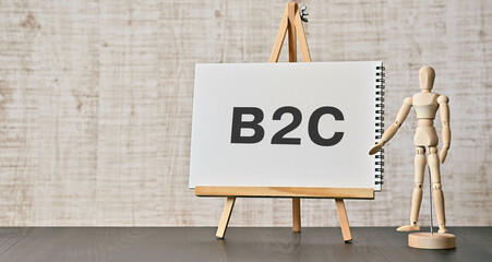 There is notebook with the word B2C. It is as an eye-catching image.