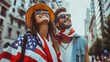 Couple in sunglasses wrapped in the American flag.