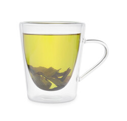 Fresh green tea in glass mug and leaves isolated on white