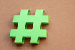green paper handmade hashtag symbol