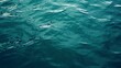 Blue sea water surface texture background. Close up of sea surface.