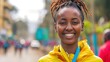 A young African woman, with a look of accomplishment and a medal, is celebrating her win in a marathon in Addis Ababa, Ethiopia