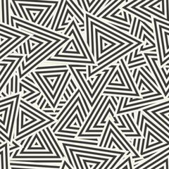 abstract geometric pattern with concentric triangles scattered in a random pattern. seamlessly repea