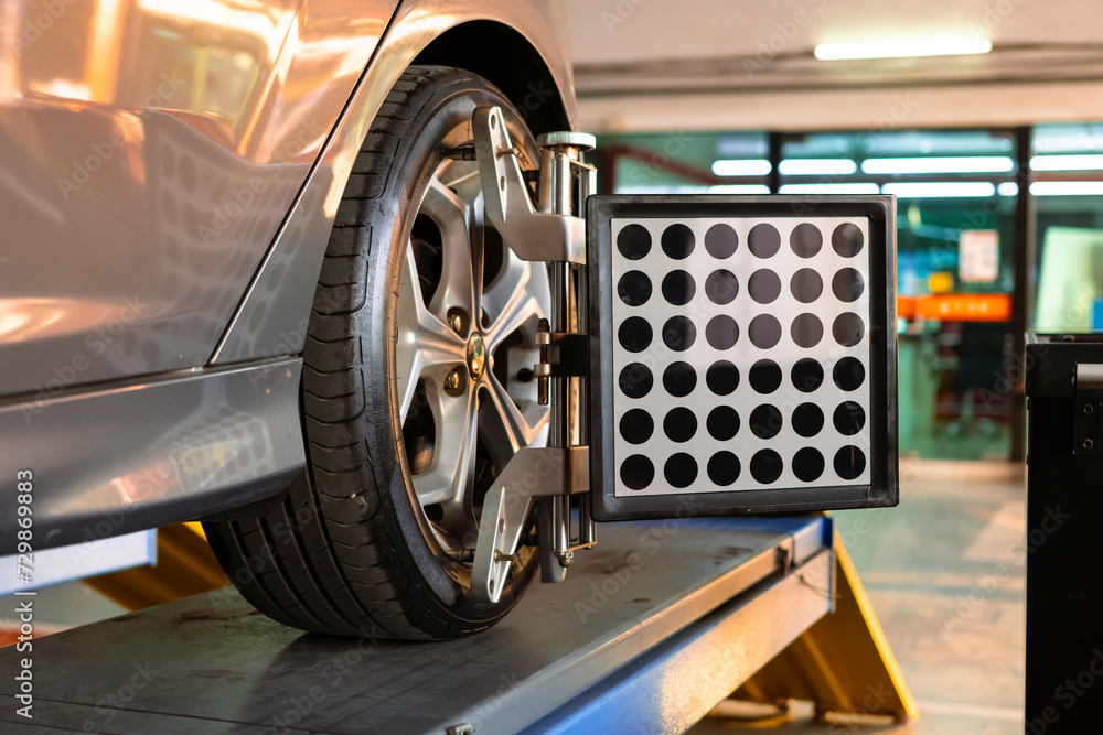 Car wheel angle alignment is in progress. auto camber toe check fixing ...