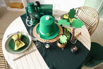 Festive table serving with leprechaun's hat and decorations for St. Patrick's Day celebration