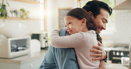 family, father and daughter hug in the kitchen for love, trust or bonding together in their home. ki