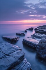 Wall Mural - Soft, pastel hues reflecting off a tranquil seascape during twilight.