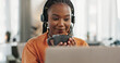© Coetzee/peopleimages.com - Black woman, headset and coffee in home office with laptop and remote work and break in apartment. Virtual assistant at desk with computer, drink and relax with freelancer, consultant or crm agent.