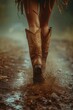 Female legs in cowboy boots