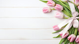 Fototapeta Tulipany - Top view of a white wooden background