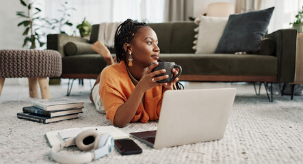 Aufkleber - Laptop, coffee and woman on the floor in living room of modern apartment reading information. Technology, relax and young African female student study and drink latte on computer in lounge at home.